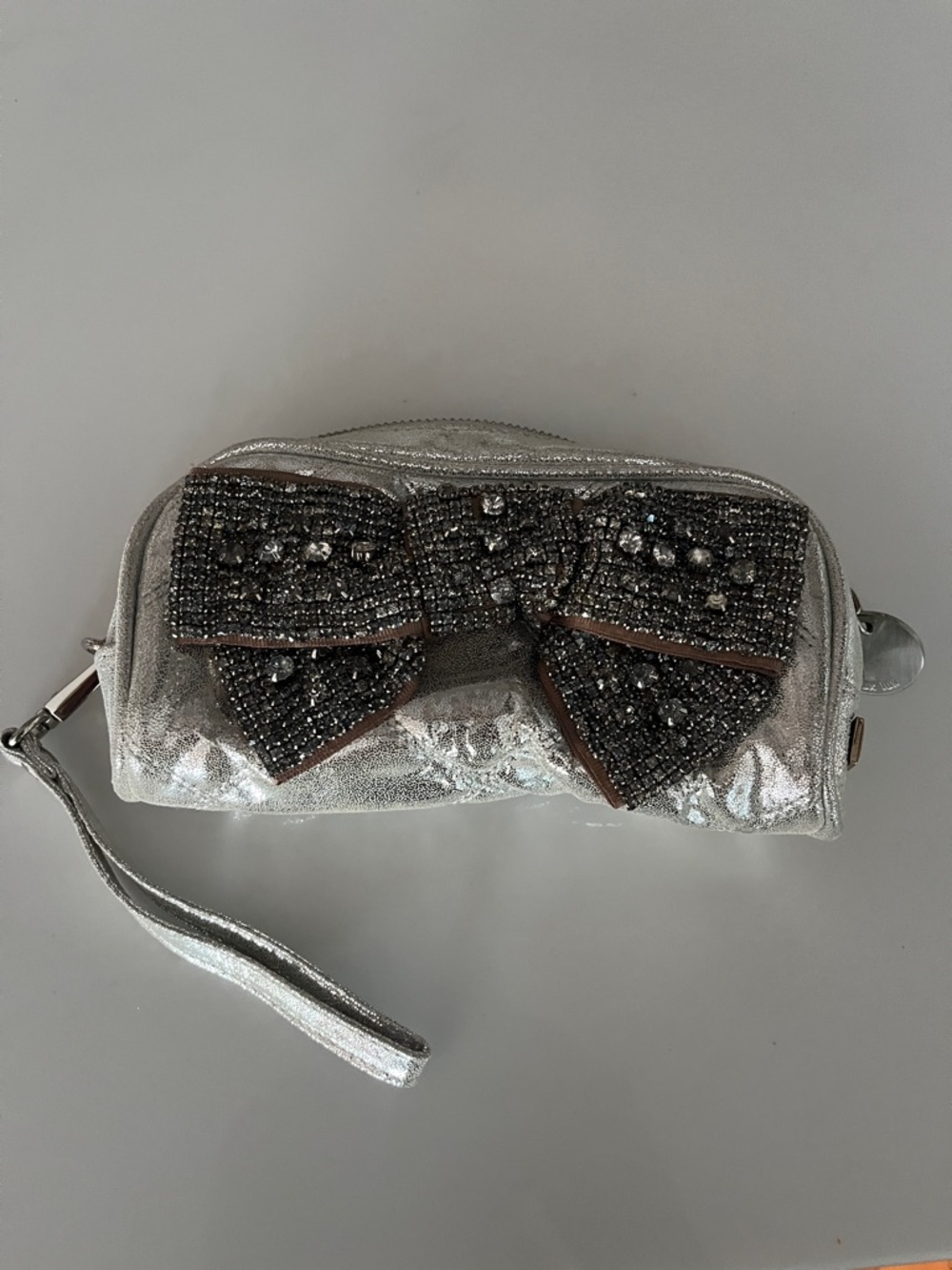 Deux Lux Silver Beaded Bow Wristlet Clutch